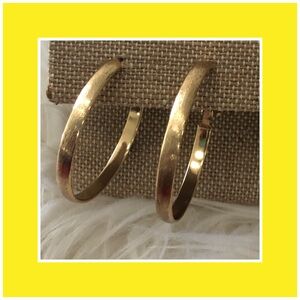 Gold loop earrings